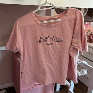 Pastel pink short tee top shirt with minimalistic building design